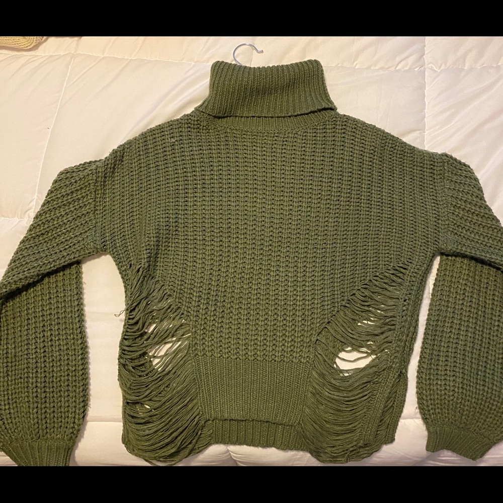 Dark green distressed turtleneck.